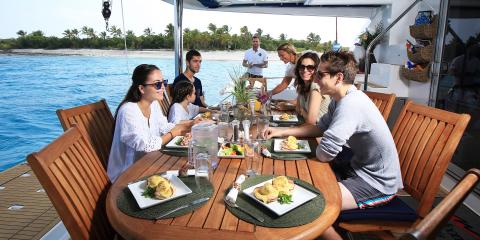 Family dining on Moorings 5800